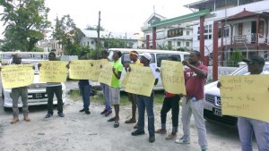 Minibus operators protesting outside the Ministry of Public Security yesterday.