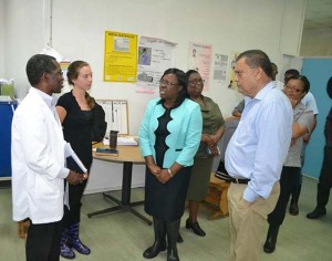 Minister within the Ministry of Public Health Dr. Karen Cummings speaks with head of the Maternity Department of the Georgetown Public Hospital Corporation, Dr. Lucio Pedro and Dr. Lindsay Evans, a consultant. CEO Michael Khan pays attention.
