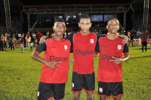 (from left)- Omar Brewley, Dequan Hercules and Kendolph Lewis take a photo op following their win over Waramadong yesterday at Leonora.