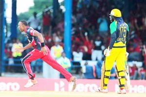 DWAYNE’S DELIGHT! Chris Gayle falls to Dwayne Bravo, after scoring 28 in the first over at Queen’s Park Oval. (CPL)