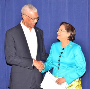 President David Granger meets Trinidad and Tobago’s Prime Minister, Kamla Persad- Bissessar in Barbados.