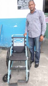 FFTP Senior Manager, Jimeel Davis with an assembled wheelchair