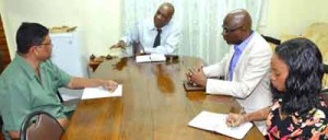 LCDS assessment: From left is GFC’s head, James Singh; Minister of State, Joseph Harmon; Presidential Advisor on the Environment, Rear Admiral (Ret’d) Gary Best, and Malika Ramsey, Press Secretary. 