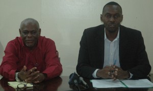 Director of Sport, Christopher Jones (right) updates the media yesterday on the status of Guyana hosting the first stage of the Inter-Guiana Games along with NSC Administration Officer, Gervy Harry.