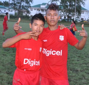 (from left)- Orealla goalscorers Donnell France and Cleon Henry pose for a photo op following their win over BEI.