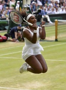 Serena Williams of the U.S.A. celebrates after winning her match against Victoria Azarenka of Belarus at the Wimbledon Tennis Championships in London, July 7, 2015.  (Reuters/Toby Melville)