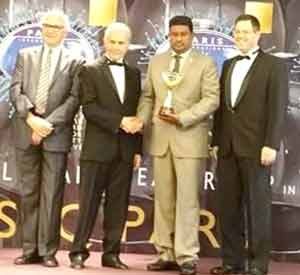 Mr Lloyd Singh (second from right) with the organizers of the award ceremony