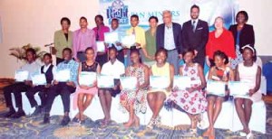 (Fourth from left in the top row) Minister of Education, Dr, Rupert Roopnaraine with representatives of RBL and the Early Start awardees.  