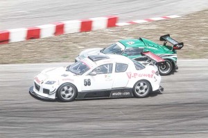 Guyana’s Mark Vieira (58) battling for track position with Stuart Williams of Barbados at last year’s CMRC round at Bushy Park.  (Photo: Ozzman)