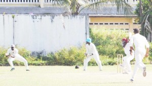 Mark Smith is about to be dropped by Kareem Naughton to deny Edwin Burnett a 5-Wkt haul at MSC yesterday.