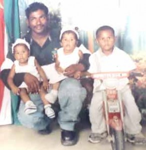 Missing: Omkar Narine Bissessar with his children a few years ago.