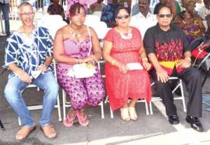 Prime Minister Moses Nagamootoo (right) and wife Sita Nagamootoo with Minister of Business and Investment Dominic Gaskin (left) at the ACDA Emancipation Day celebrations at the National Park 