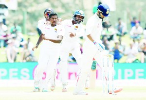 Rangana Herath is all fired up after getting the wicket of Ajinkya Rahane, Sri Lanka v India, 1st Test, Galle, 4th day, August 15, 2015 ©AFP