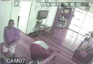 Do you know this man? Camera footage of the killer in the upper flat of the building.    