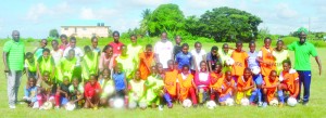 Armed with a plethora of new life and football skills information, the bunch of happy youngsters take time out for a photo op with their facilitators. 