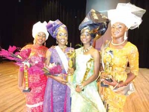 A moment Like This: Akeila Day, Miss Emancipation 2015(2nd from left) shares a royal moment with her runners up at the National Cultural Center.  