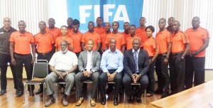 Smartly attired, the referees take time out for a photo op with FIFA and other officials just before the commencement of the programme. 