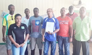 GFF’s Richard Groden (2nd right, back row) and Deidre Davis (left front) with representatives of the clubs in Bartica following the meeting. 