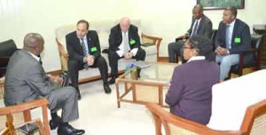 CAL officials meeting with Minister of State, Joseph Harmon, yesterday.