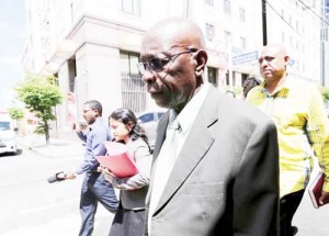 Former FIFA Vice-President Jack Warner walks after leaving the Magistrate’s Court in Port-of-Spain September 25, 2015. (Reuters/Andrea De Silva)