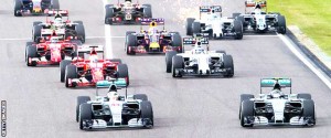 Hamilton overtakes Nico Rosberg at the start of the race. (Getty Images)