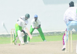  Shiv Chanderpaul  on-drives Gudakesh  Motie during his  unbeaten innings.