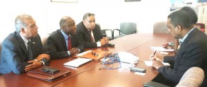 Foreign Affairs Minister, Carl Greenidge (Centre left), and his team, meeting with senior editors of the Miami Herald newspaper recently while on a visit to Florida. (Wesley Kirton photo)