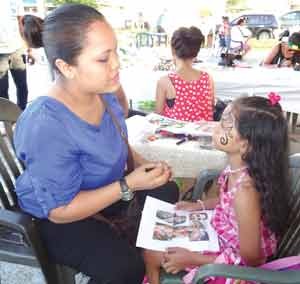 Face painter Latoya Moffat