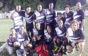 The Demerara Queens enjoy a photo op shortly after defeating Eagles United 