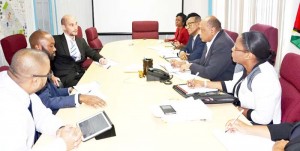 The Commonwealth experts meeting with Minister Raphael Trotman and team yesterday.