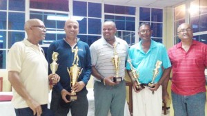  From left; winners Roy Cummings, Pur Persaud, Troy Cadogan, Patrick Prashad,  and President ‘Shyam’ Ramroop at the presentation.