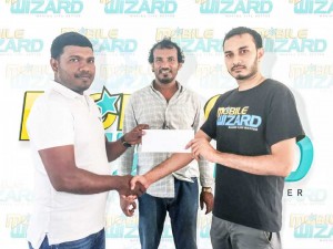 Ammiel Azeez ( left) collects sponsorship check Mobile Wizard proprietor  Syed Ali as President of GSL - Mr Halim Khan (centre) looks on.