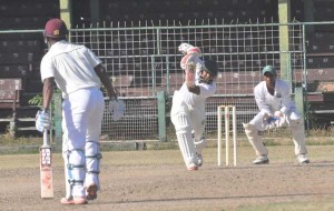 Assad Fudadin plays an imperious cover drive during a magnificently constructed 82 at Bourda yesterday. 