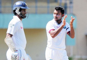  Devendra Bishoo celebrates the exit of Lahiru Thirimanne, Sri Lanka v West Indies, 1st Test, Galle, 1st day, October 14, 2015 ©AFP