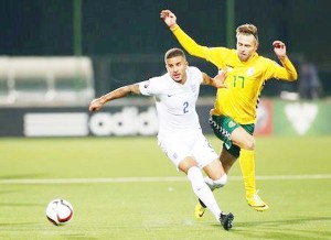 England’s Kyle Walker in action  with Lithuania’s Arturas Zulpa.  (Action Images via Reuters /  Carl RecineLivepic) 