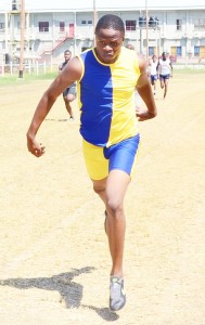 Jason Yaw comfortably  wins the Boys’ 400m race at  the Police Sports Club  Ground on Friday.
