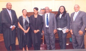  (from left to right)  Attorney at Law , Nigel Hughes;  Justice Roxanne  George-Wiltshire,  Attorney -at –Law, Savannah Barnwell, her grandfather Edgar Heyligar, her mother, Yonette Heyligar and  Attorney, Andrew Pollard. 