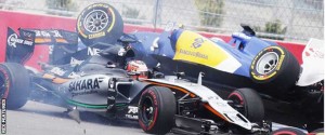 Marcus Ericsson’s Sauber ended up on top of the Force India of Nico Hulkenberg after a collision on the first lap. (Rex Features)