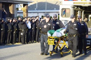 The body of Police Officer Randolph Holder is brought to the Jerimiah Gaffney Funeral Home in Far Rockaway.