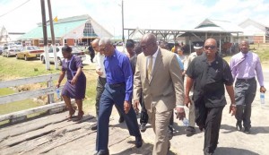 President Granger with Chief Education Officer Olato Sam and delegation headed to the dorms.