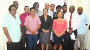 Ministers Ronald Bulkan and Dawn Hastings-Williams (centre) flanked  by the Regional Executive Officers for the 10 Geographic Regions.