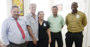   Dr. Rupert Roopnarine (2nd left) with officials of the Guyana Cricket Board.  