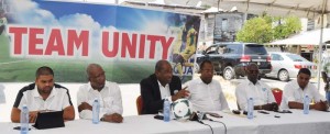 Nigel Hughes makes a point during official remarks at the launch of Team Unity slate yesterday in Albouystown.