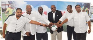 Team Unity in Unison for Battle! Presidential candidate Nigel Hughes (3rd right) and some members of his team from right, Javid Ali, Mark Waldron, Aubrey Major, Odinga Lumumba and Robbie Ramberran after yesterday’s launch.