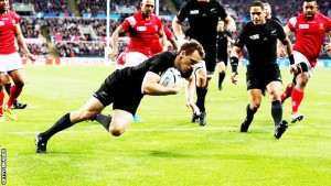 Ben Smith powers home to score for New Zealand during the first half against Tonga. (Getty Images)