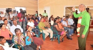  President David Granger, during an interactive session at the Mibicuri Community Developers building on Sunday, with residents of Black Bush Polder, East Berbice