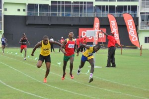 PHOTO FINISH! North Georgetown’s, Orin Prince (right) out-leans Corentyne’s, Kevin Norah (centre) and Upper Demerara’s, Shaquille Smartt to win the 1500m Boys’ Under-20 race at the National Stadium yesterday.