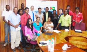 the recipients and Business Ministry staff, with Minister of Business Dominick Gaskin (third from left, back row); United Nations representative, Reuben Robertson (fifth from left, back row); Chile’s Ambassador to Guyana, Claudio Rachel Rojas (seventh from left, back row)