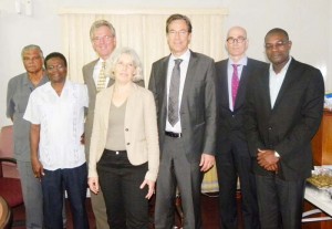 Minister David Patterson (extreme right), local drainage officials and the Dutch team meeting Thursday for the presentation of an interim report.