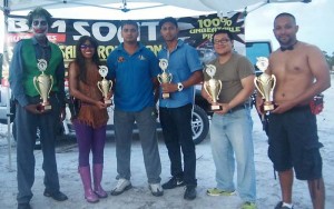 Trophy Winners surround Mr. Roberto Tewari (3rd left), representative of sponsor B.M. Soat Auto Sales.